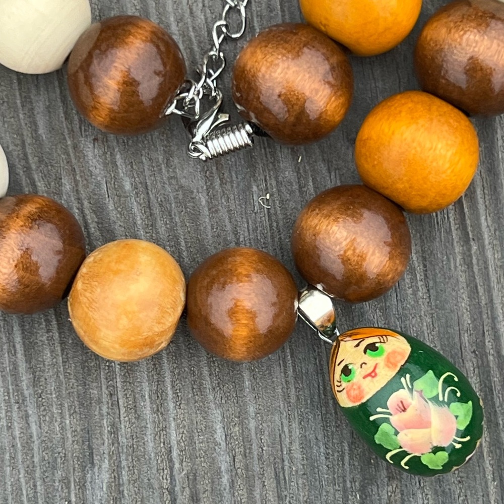 Handmade Wooden Beaded Necklace with Russian Nesting Doll Pendant